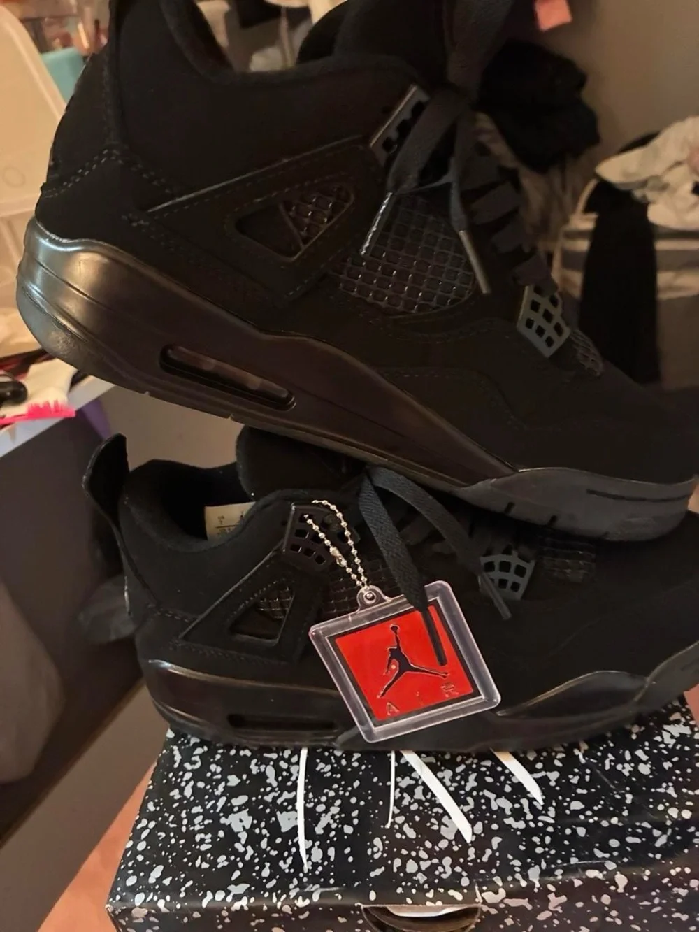 Jordan Men's Black Retro Basketball Sneakers with Red Logo Tag